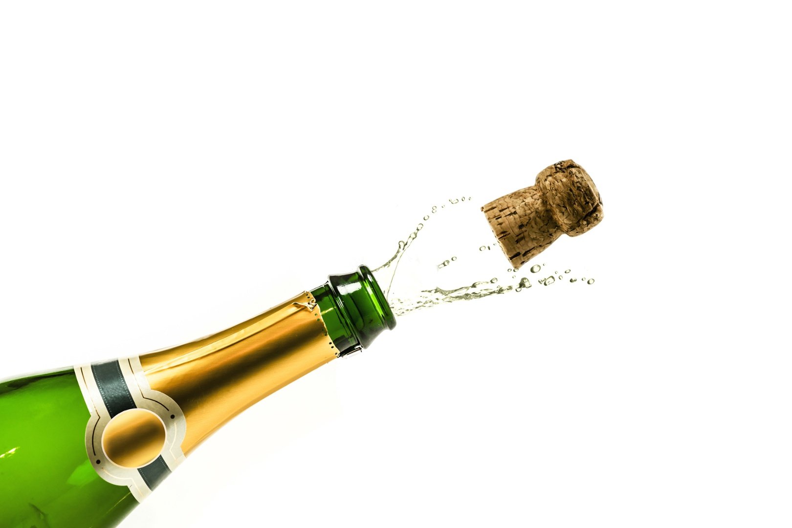 Popping Champagne Cork On White - Stock Photos